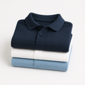 Kids school uniform polo 3-pack — stack of three folded pique polos