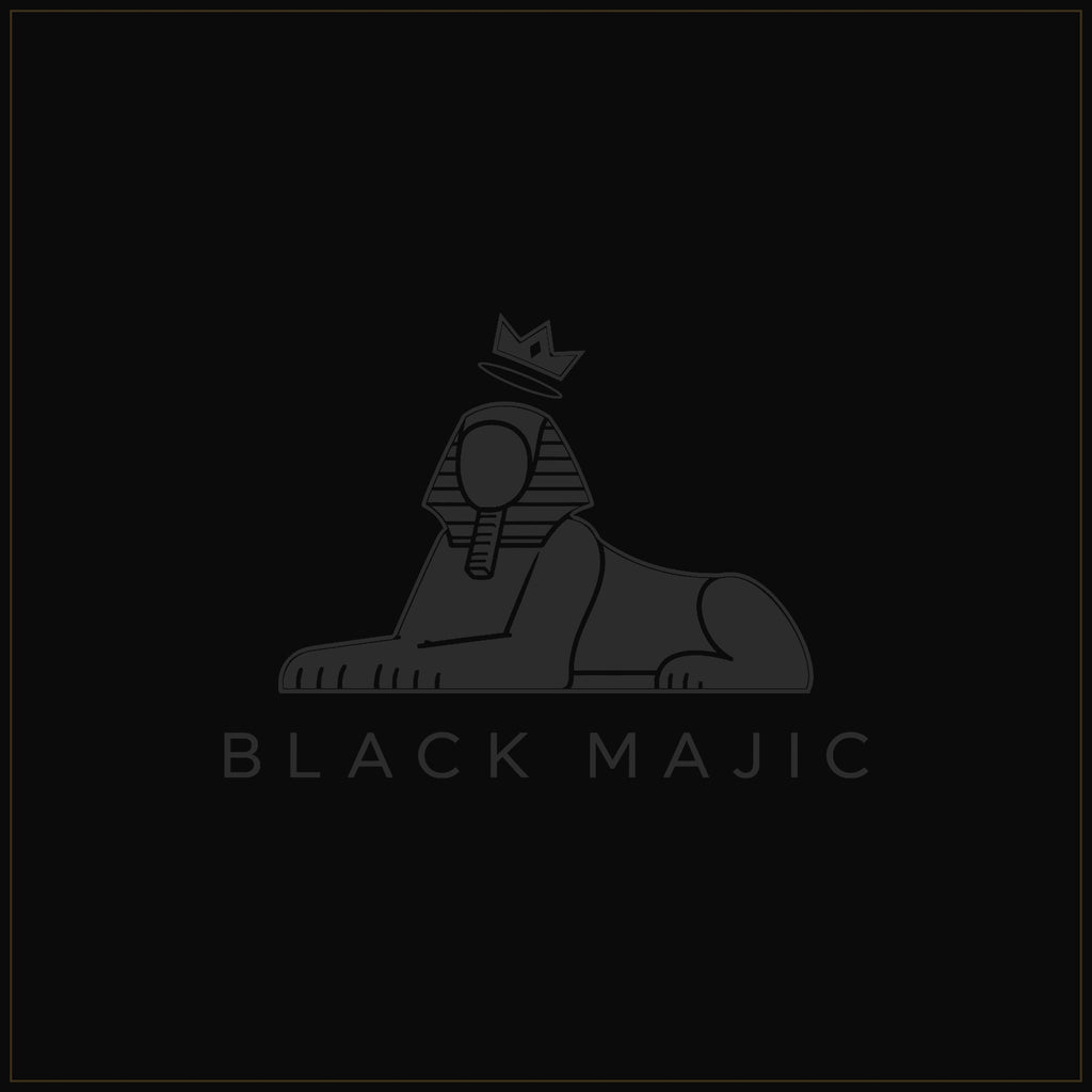 The BLACK MAJIC lockup in tonal black — the crowned Sphinx as it reads stitched black on black