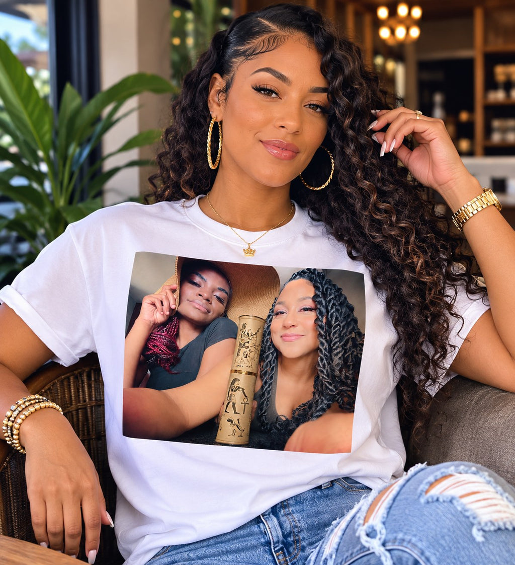 Velvet Ritual Session Tee in white — close view of the two queens and gold Egyptian scroll print