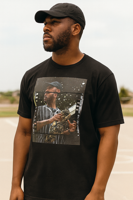 Black man in the Summer Static Pinstripe Frame Tee, bright court